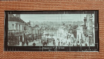 The supermarket chain Lidl commissioned Liverpool’s bespoke tile specialist, Tile Fire, to manufacture and install two bespoke tile murals depicting the town’s history at their new store in Halstead, Essex. The supermarket chain Lidl commissioned Liverpool’s bespoke tile specialist, Tile Fire, to manufacture and install two bespoke tile murals depicting the town’s history at their new store in Halstead, Essex.